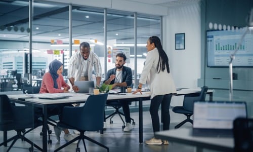 Employees meeting in an office conference room.