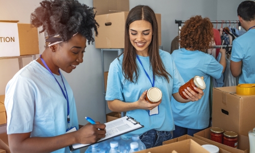 Volunteers packing boxes