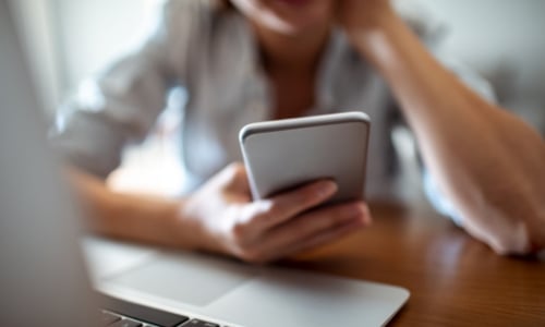 Woman using her cell phone