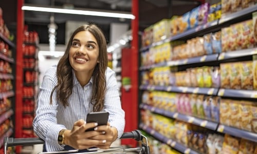 A woman grocery shopping