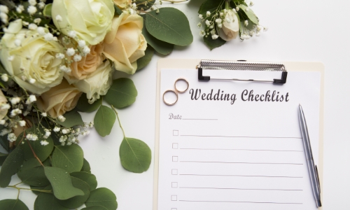 A wedding checklist attached to a clipboard