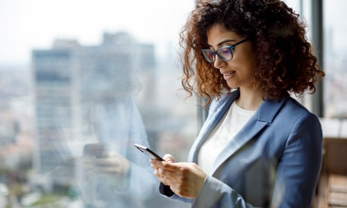 Businesswoman using smart phone