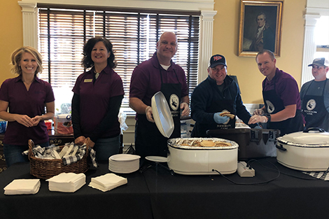 Jefferson Bank employees giving back to the community by serving food
