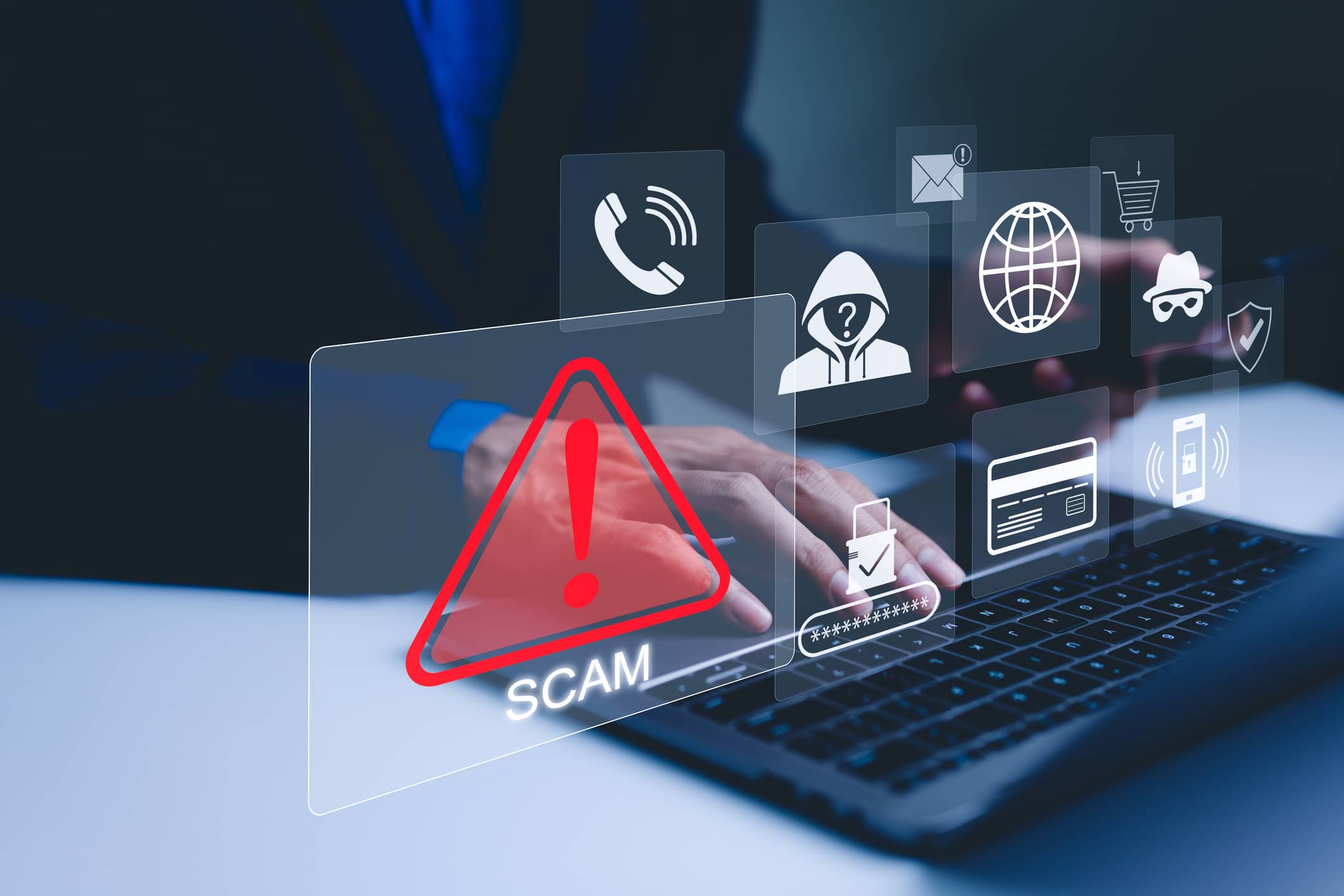 Scam alert warning with cybersecurity icons coming from a laptop