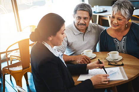 Retired couple meeting with advisor