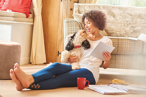 woman sitting in her new home