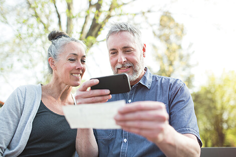 Man depositing a check on the mobile app