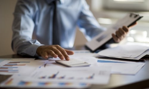A tax advisor crunching numbers