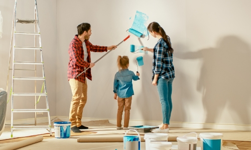 A family painting to fix up a house