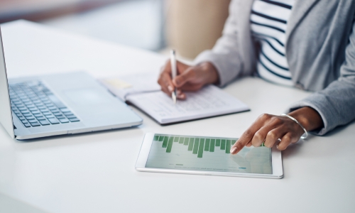 A woman studying charts