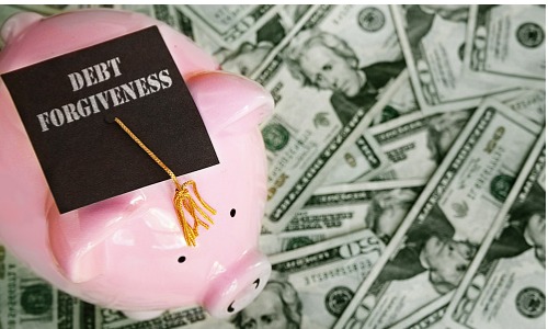 Piggy bank wearing debt forgiveness graduation cap